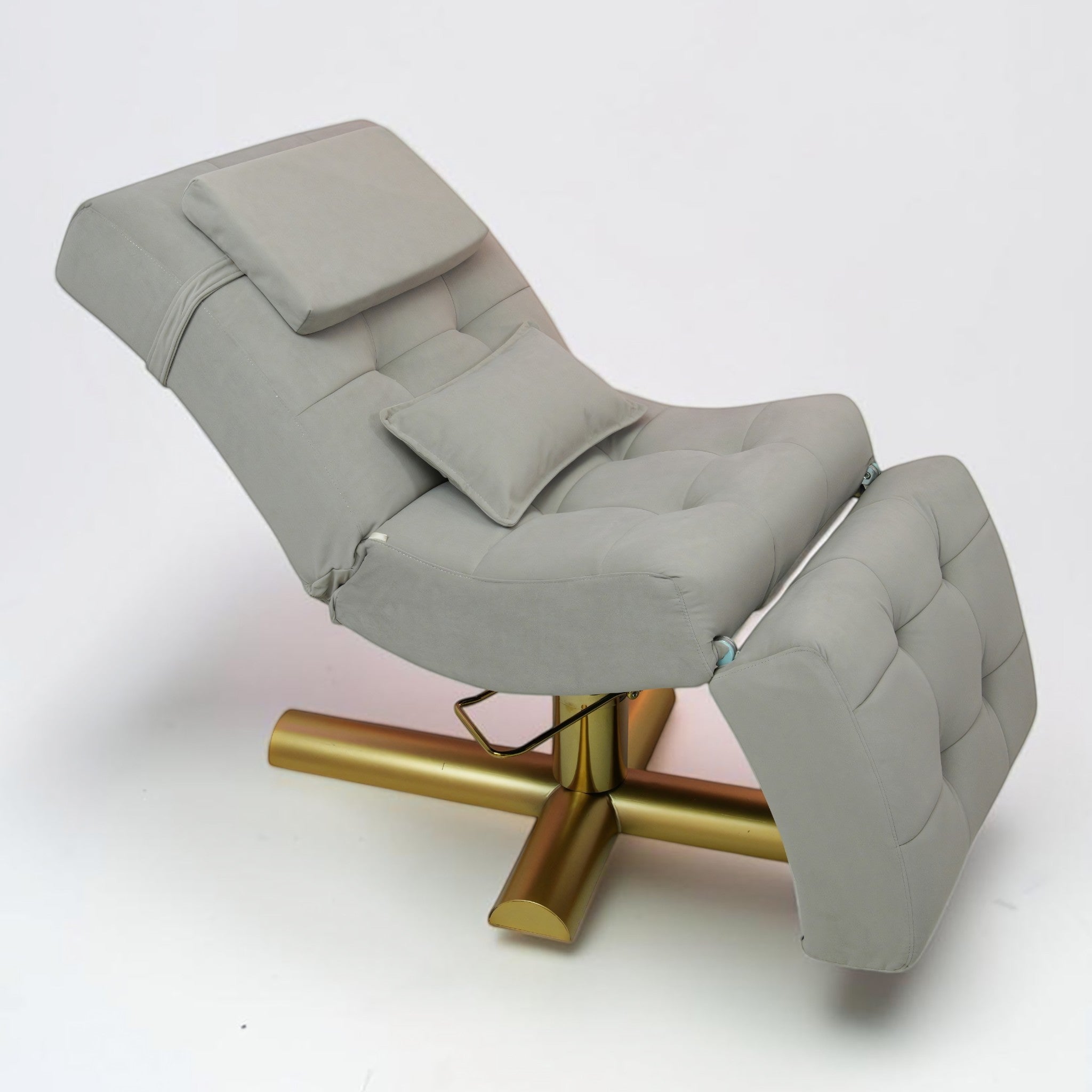 MK BEAUTY BED ergonomic curved treatment bed in grey leather with a gold hydraulic base for salon use.