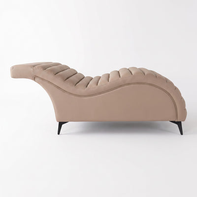 MK BEAUTY BED Plush Curved Bed in beige leather with an ergonomic silhouette and high-density cushioning.