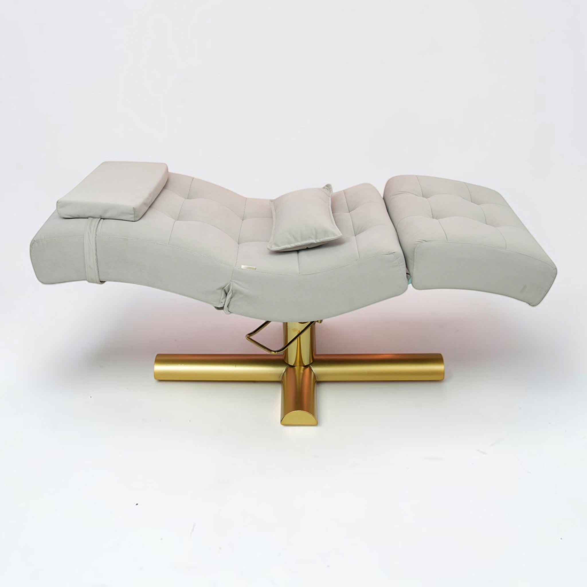 MK BEAUTY BED All in One curved treatment bed in light grey with a gold hydraulic base for salon use.