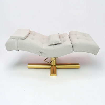MK BEAUTY BED All in One Curved Bed in light grey with a gold X-cross base for professional salon treatments