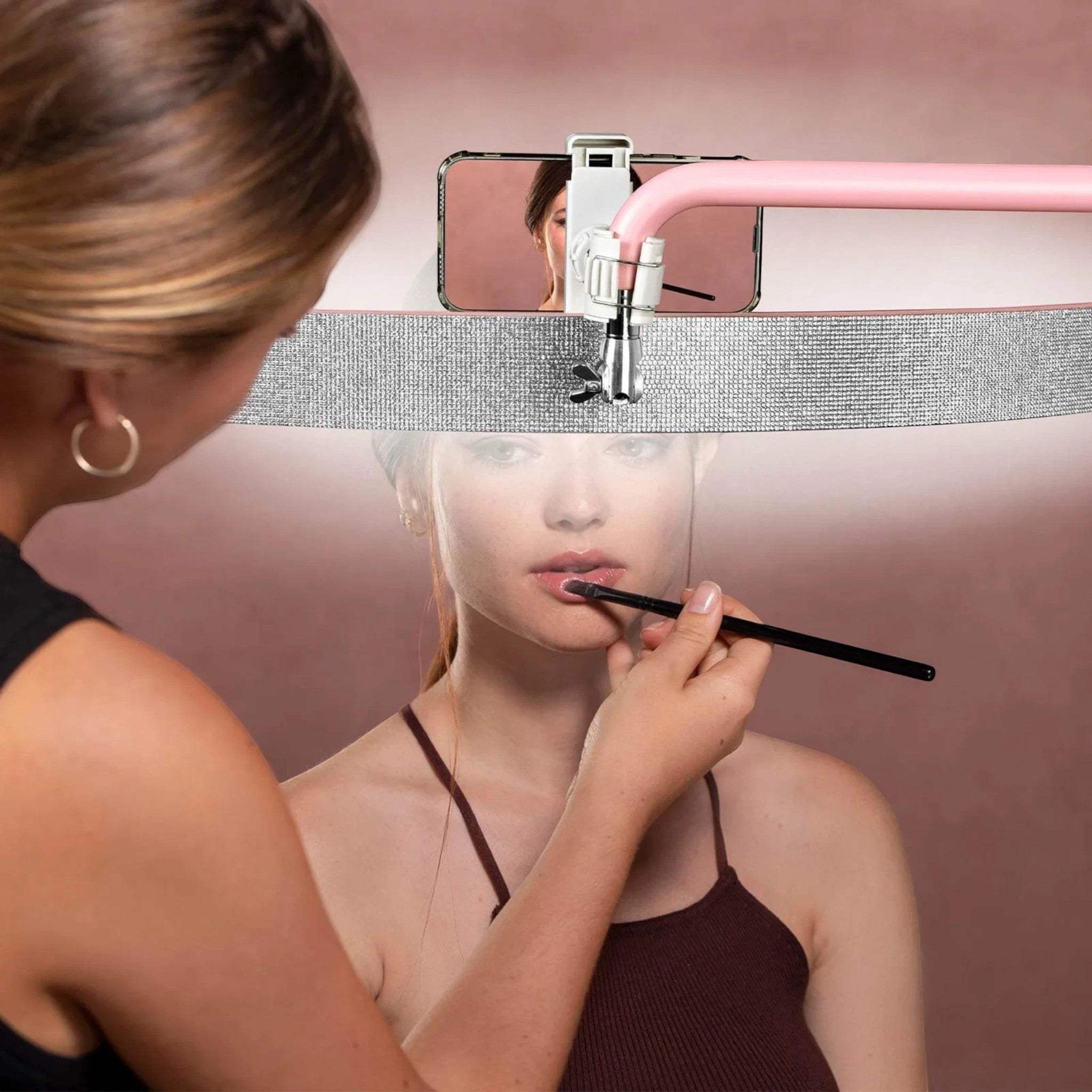MK BEAUTY BED diamond half moon LED light illuminating a model during a professional makeup application