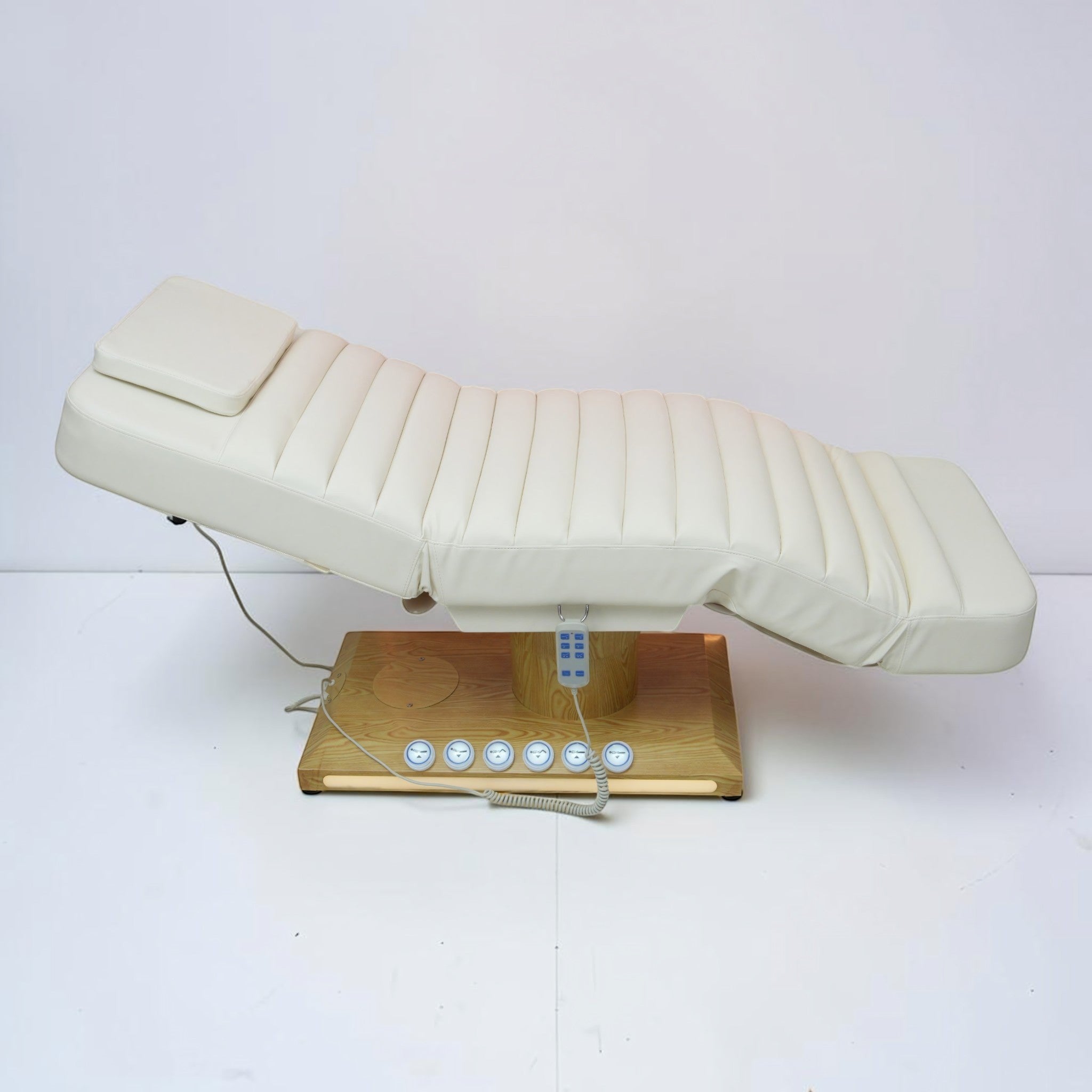 MK BEAUTY BED luxury electric treatment bed in cream PU leather with wooden base and handheld remote control