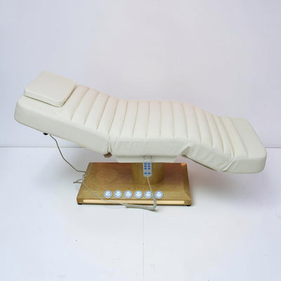 MK BEAUTY BED luxury electric treatment bed in cream PU leather with wooden base and handheld remote control