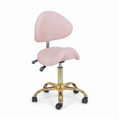 MK BEAUTY BED Ergo Stool in soft pink with an ergonomic saddle seat, adjustable backrest, and gold base.