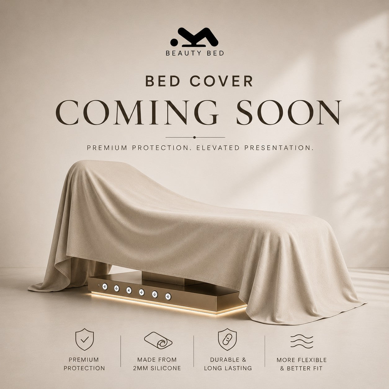 MK BEAUTY BED fitted silicone cover draped over a professional treatment bed in a neutral studio setting