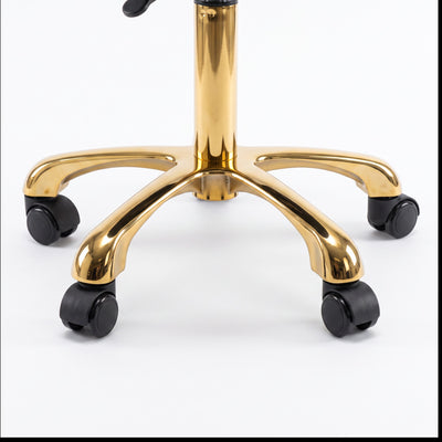 MK BEAUTY BED Waffle Stool gold metallic five-star base with smooth rolling black castors on a white background